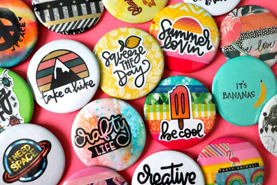 a collection of colorful pins